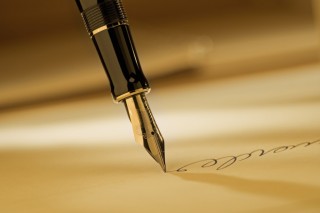 g-pen-writing-on-paper