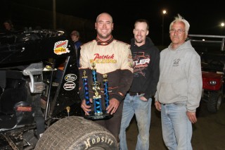 Kyle Patrick with his father Bill and his head mechanic Matt Furtney in the middle - James MacDonald ApexOne Photo
