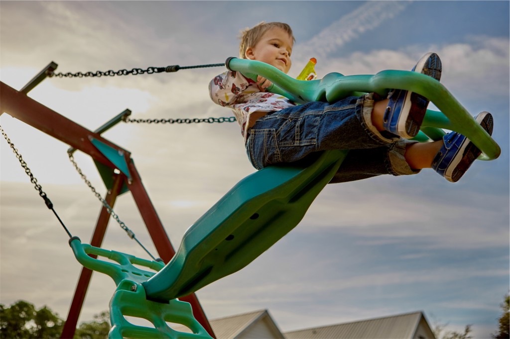 youth child playing swing fun