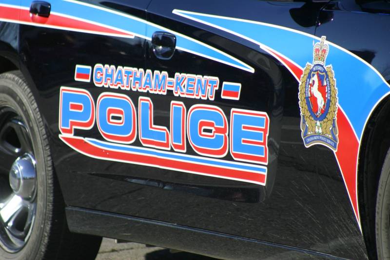 Whiskey bottle smashes glass door