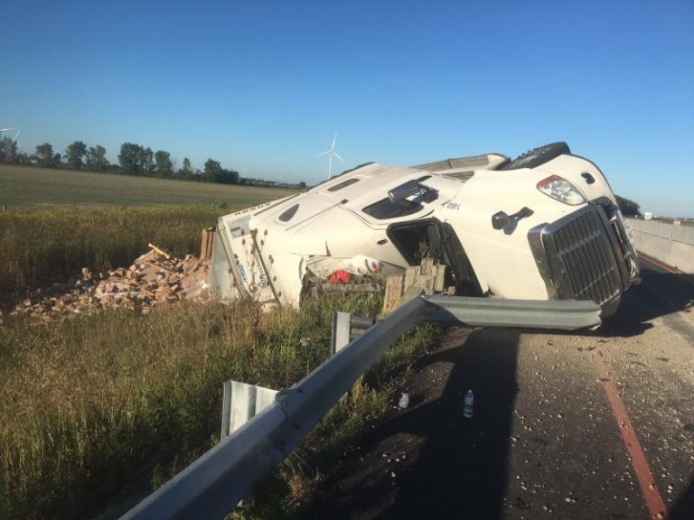Transport rolls into ditch on the 401